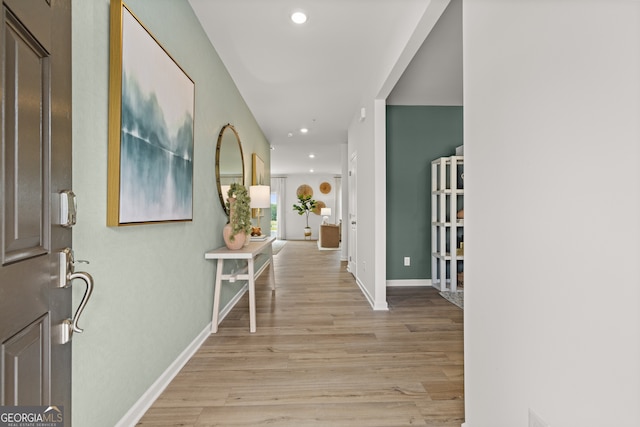 corridor featuring light wood-type flooring