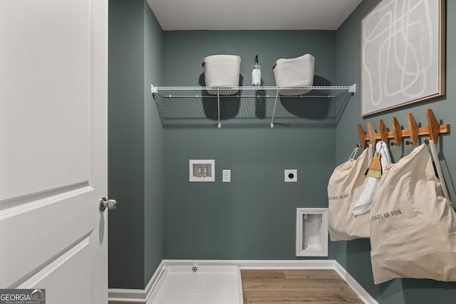 washroom featuring hookup for an electric dryer, hookup for a washing machine, and hardwood / wood-style floors