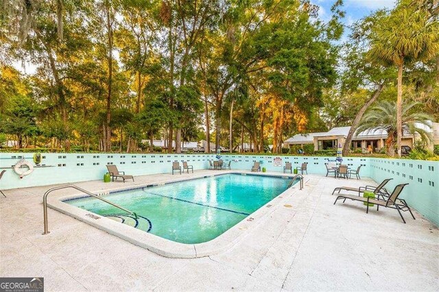 view of pool with a patio