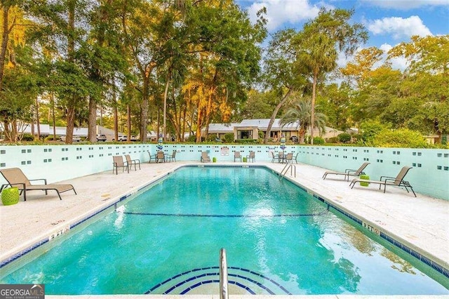 view of pool with a patio area