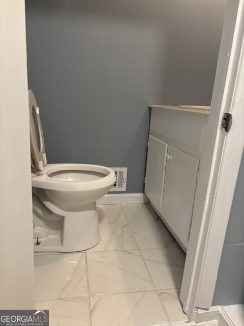 bathroom featuring toilet