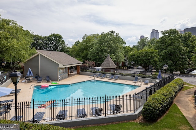 view of pool with a patio