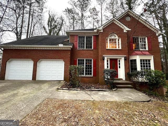 front of property with a garage