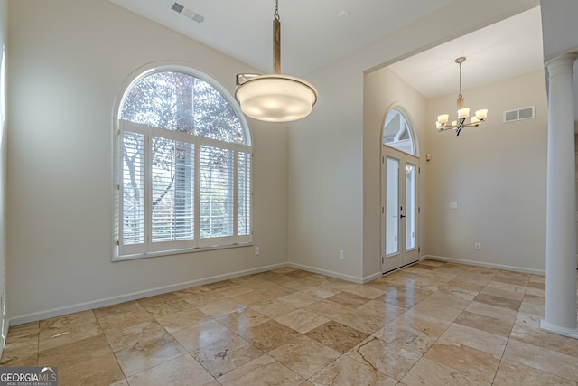 entrance foyer with an inviting chandelier