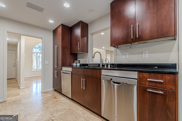 kitchen with stainless steel dishwasher and sink