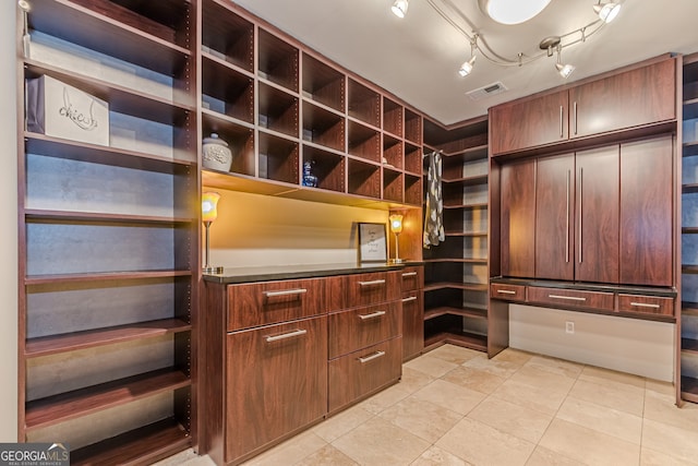 interior space featuring light tile patterned flooring