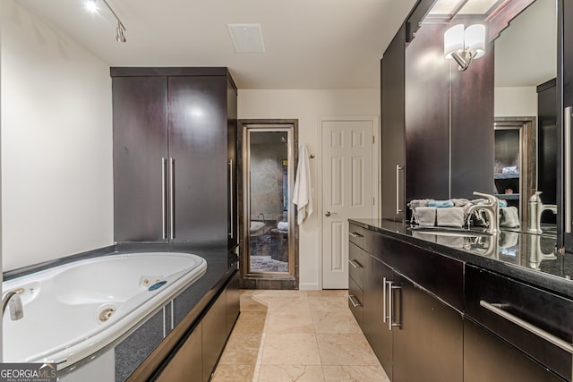 bathroom with a bathing tub and sink