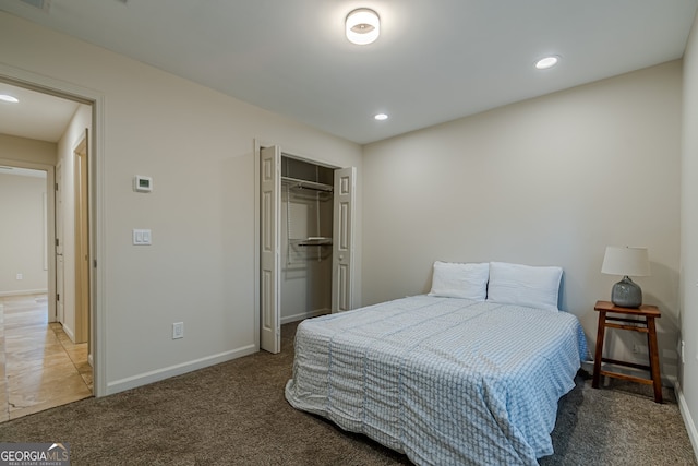 bedroom featuring a closet and carpet