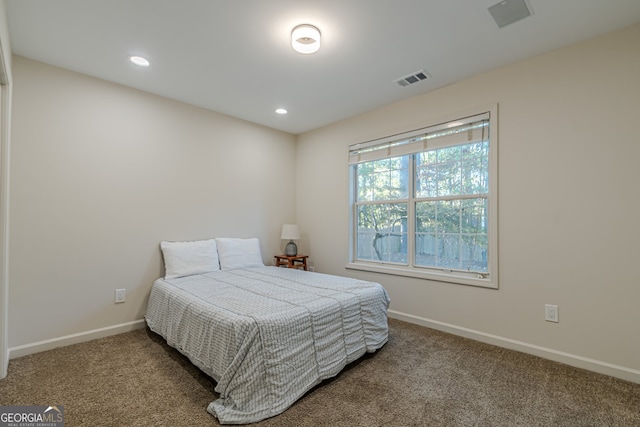 bedroom featuring carpet