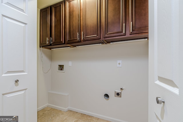 laundry room with hookup for an electric dryer, cabinets, and washer hookup