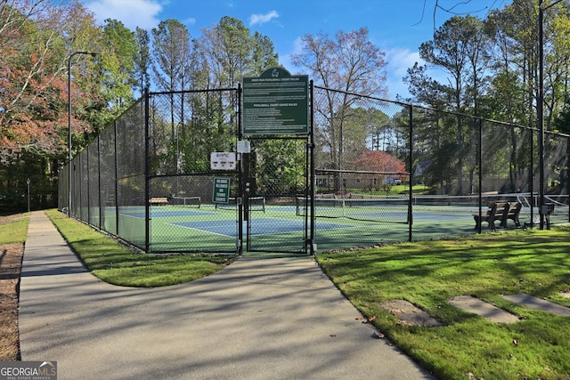 view of basketball court featuring tennis court