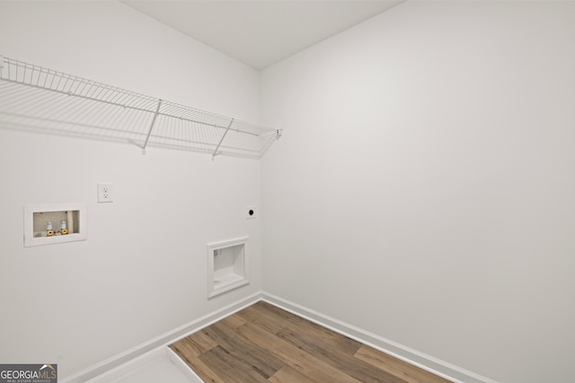 bathroom featuring a shower with door, vanity, and hardwood / wood-style flooring