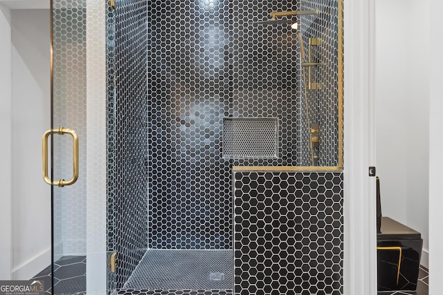 room details with an enclosed shower