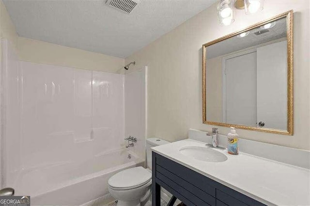 full bathroom featuring shower / tub combination, vanity, and toilet