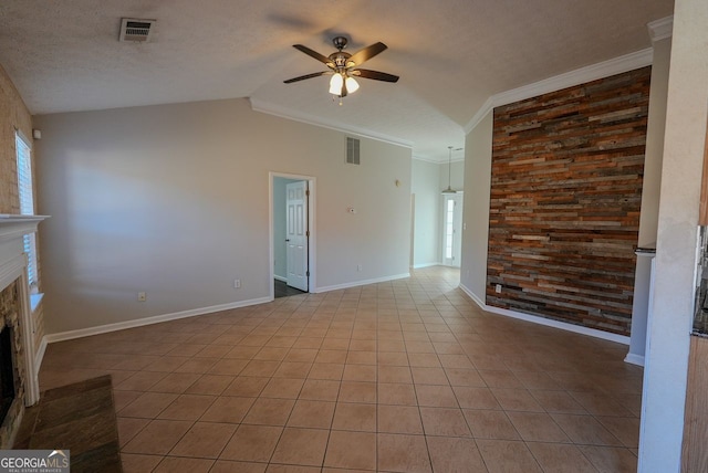 unfurnished living room featuring a textured ceiling, ceiling fan, crown molding, and lofted ceiling