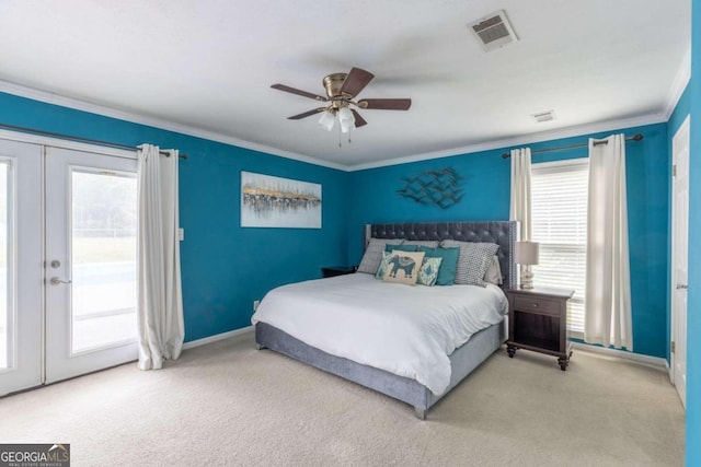 carpeted bedroom with access to exterior, french doors, ceiling fan, and crown molding