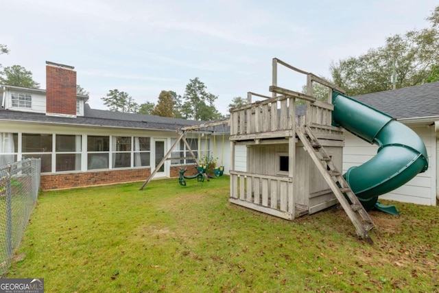 view of play area featuring a yard