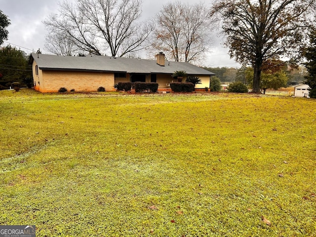 exterior space featuring a front lawn