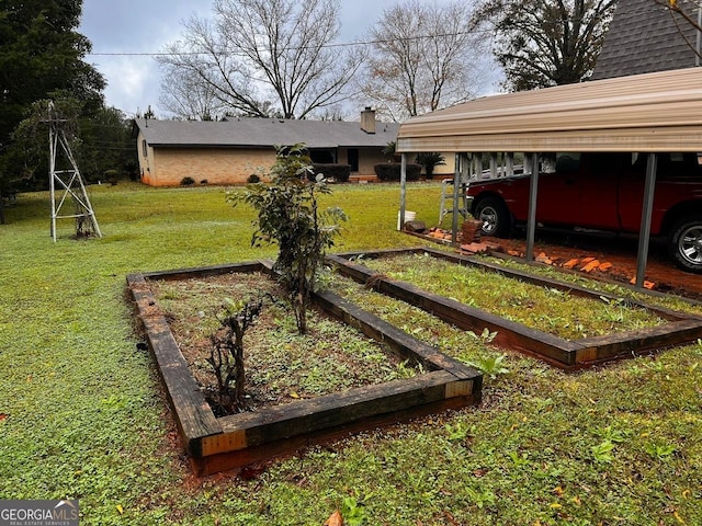 view of yard featuring a carport