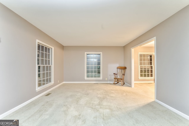 spare room with carpet floors