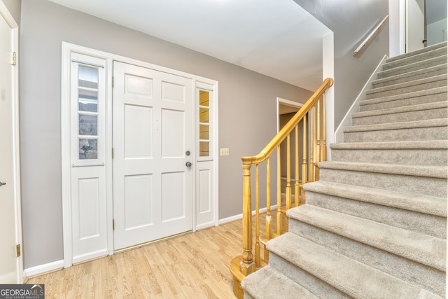 entrance foyer with wood-type flooring