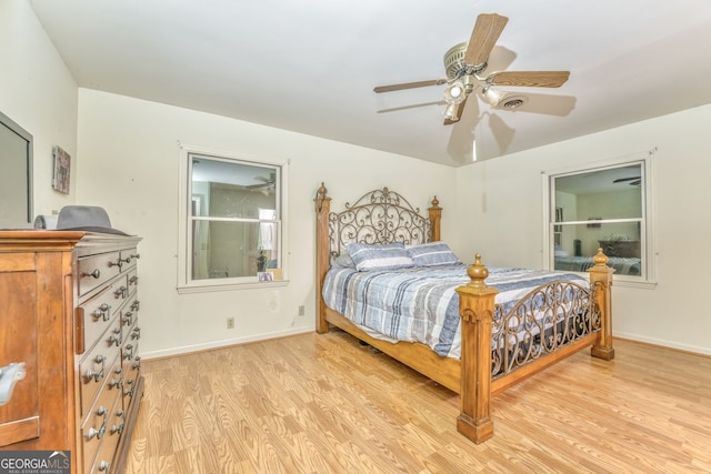 bedroom featuring ceiling fan and light hardwood / wood-style floors