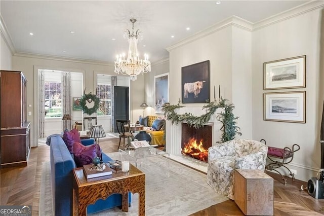 living area featuring a premium fireplace, crown molding, a chandelier, and baseboards