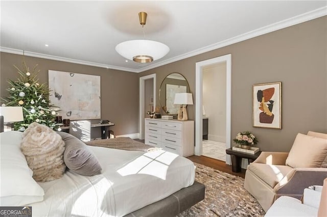 3488 Tuxedo Rd NW, Atlanta, GA 30305 - bedroom featuring ornamental molding, wood finished floors, and baseboards