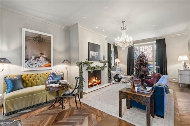 living area with crown molding, baseboards, an inviting chandelier, recessed lighting, and a warm lit fireplace