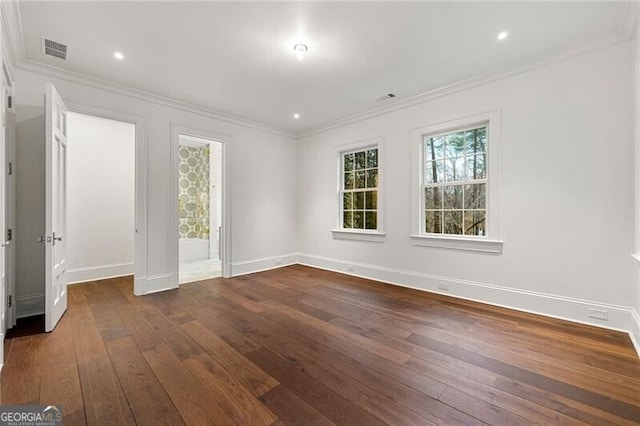 unfurnished room with crown molding, baseboards, visible vents, recessed lighting, and dark wood-style flooring