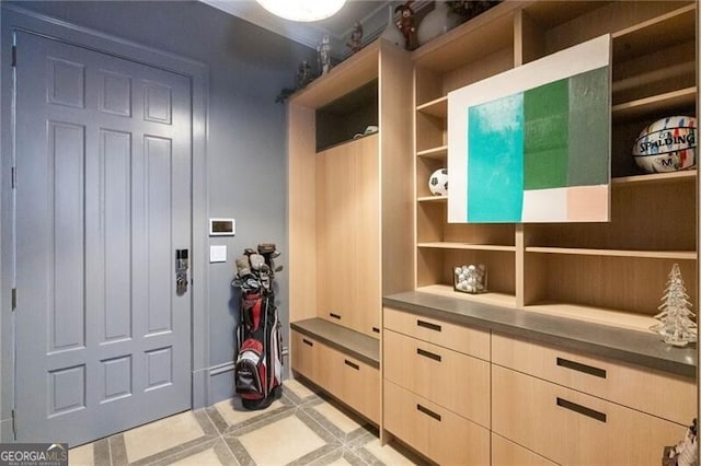 mudroom featuring light floors