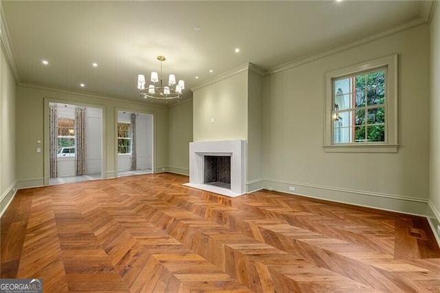 unfurnished living room featuring recessed lighting, ornamental molding, baseboards, a fireplace with flush hearth, and a notable chandelier