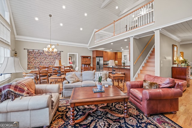 dining room with french doors, wooden ceiling, high vaulted ceiling, light hardwood / wood-style floors, and ornamental molding