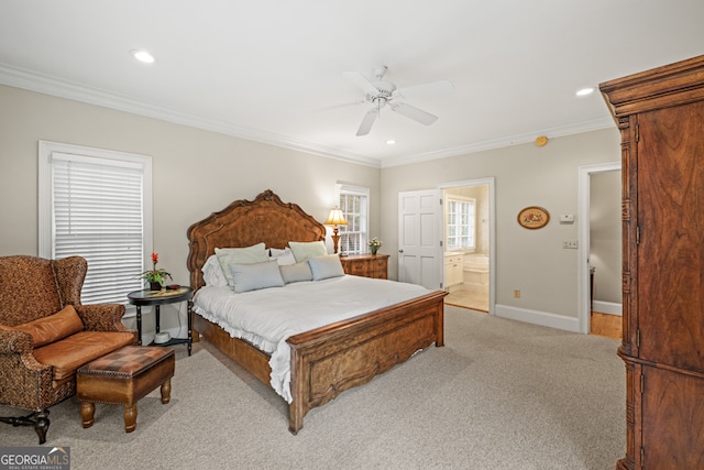 carpeted bedroom featuring ceiling fan and crown molding