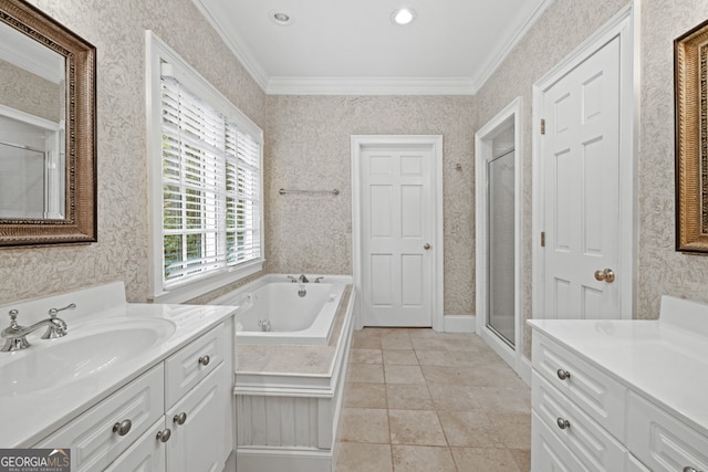 bathroom featuring a bathtub, a healthy amount of sunlight, and ornamental molding