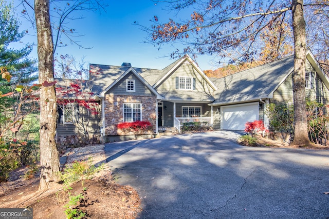 property entrance with covered porch