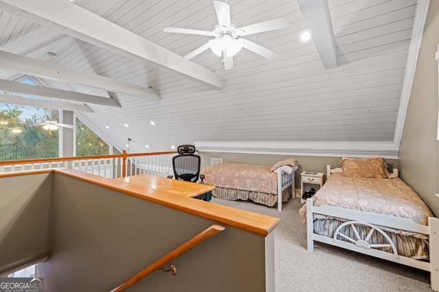 carpeted bedroom with ceiling fan and crown molding