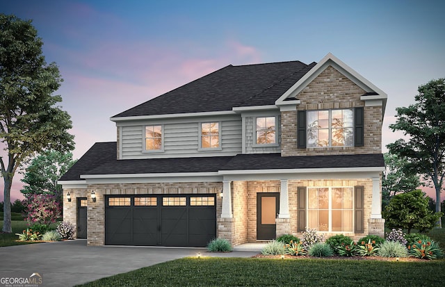 craftsman inspired home featuring a garage