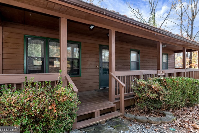 property entrance with covered porch