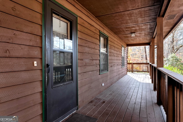 wooden deck with a porch