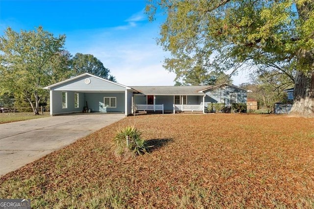 single story home featuring a carport