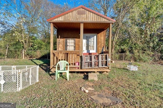 view of outdoor structure with a yard