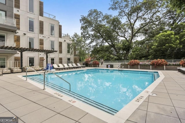 view of pool with a patio area