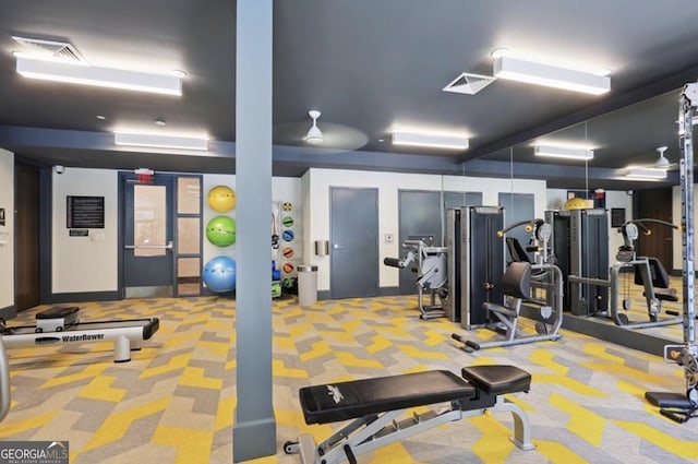 exercise room featuring carpet floors