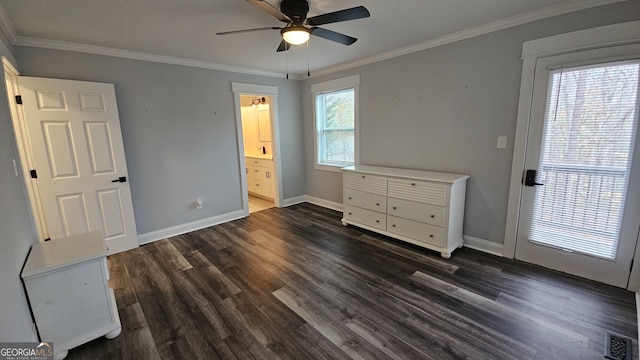 unfurnished bedroom with dark hardwood / wood-style floors, ensuite bath, ceiling fan, and crown molding