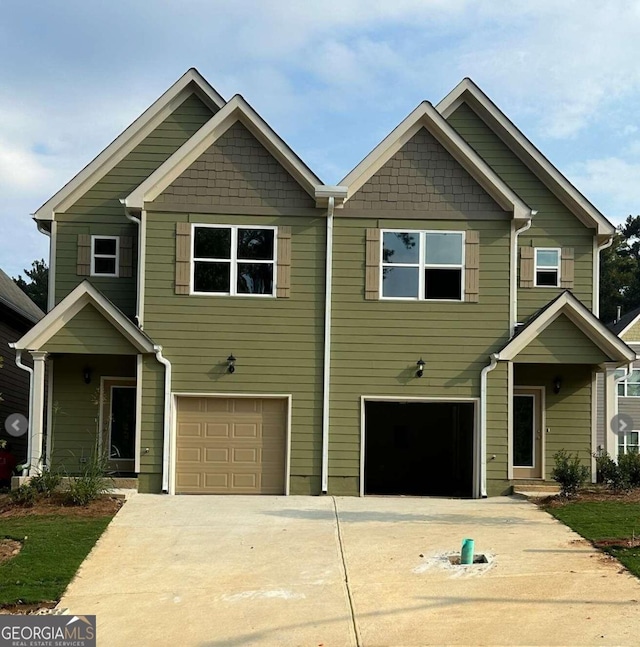 craftsman house with a garage