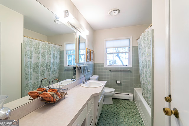 full bathroom featuring vanity, a baseboard radiator, tile walls, shower / bathtub combination with curtain, and toilet