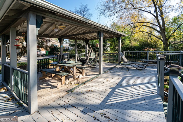 deck featuring a gazebo and ceiling fan