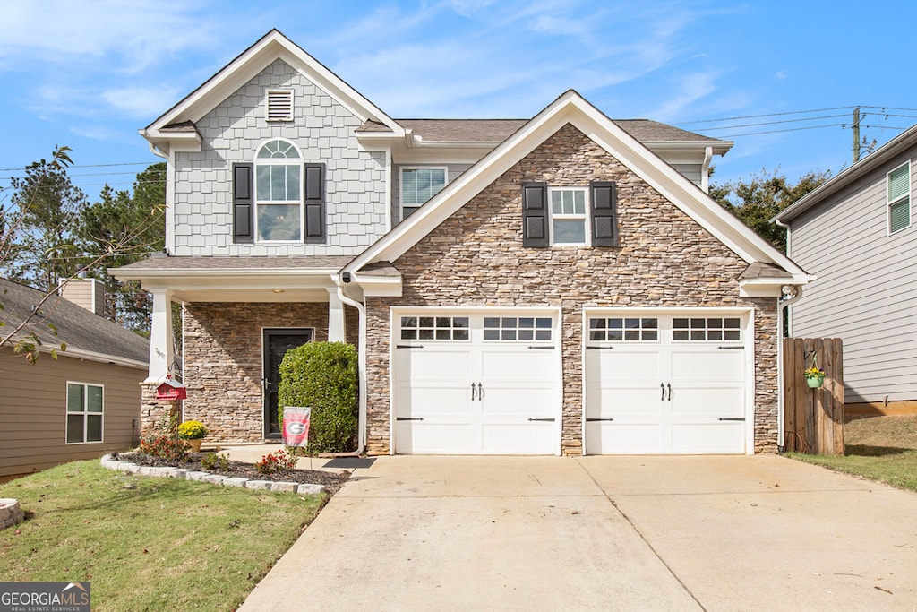 view of front of home featuring a garage