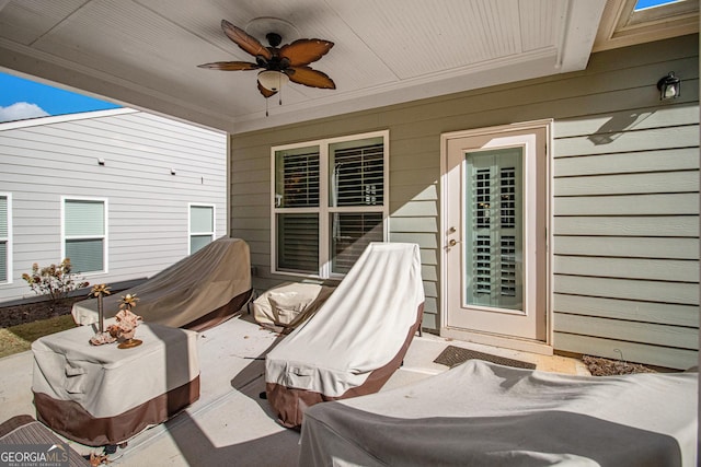 view of patio / terrace featuring ceiling fan